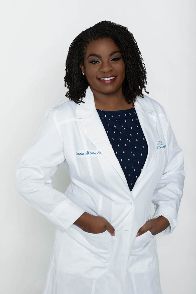 Dr Trinette Moss Headshot White Coat 2021